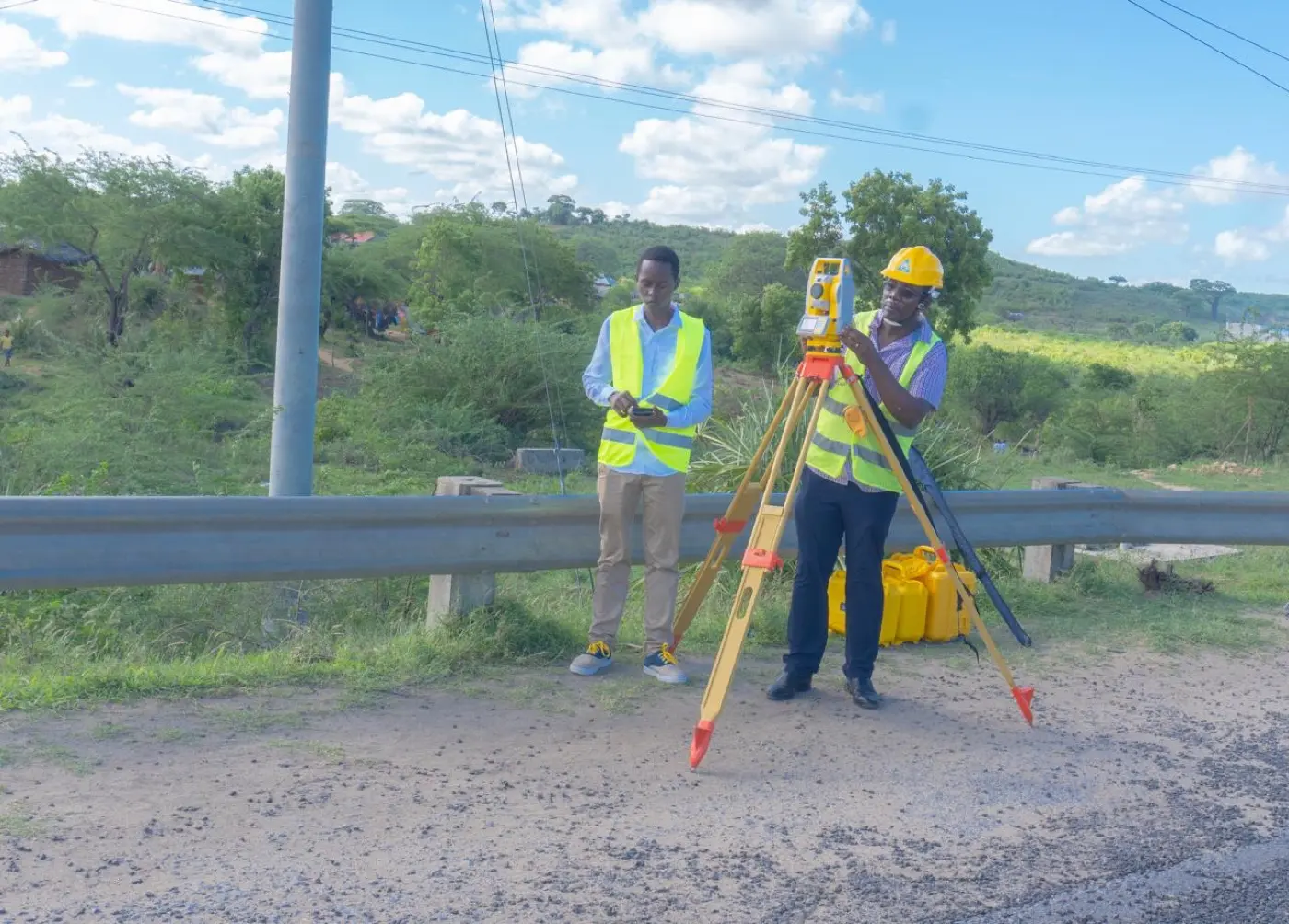 Survey team conducting topographic and engineering road surveys in Kilifi